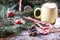 Mug with hot chocolate snow wooden table