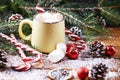 Mug with hot chocolate snow wooden table