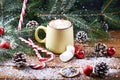 Mug with hot chocolate snow wooden table
