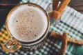 Mug of light beer with foam on a green napkin with croutons top view Royalty Free Stock Photo