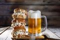 A mug of light beer and a huge burger Royalty Free Stock Photo
