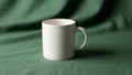 Mug s contours casting gentle shadows on both the fabric and Royalty Free Stock Photo