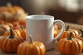 The mug sits on a table surrounded by miniature pumpkins, thankgiving symbol Royalty Free Stock Photo