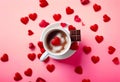 Mug with sugar and chocolate hearts on pink background. Flat lay composition. Romantic, St Valentines Day concept