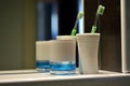 Mug and toothbrush on the shelf Royalty Free Stock Photo