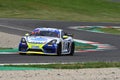 Mugello Circuit, Italy - October 8, 2021: Porsche 718 Cayman GT4 of Team Autorlando Sport driven by Baruchelli - Fratti during