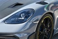 Mugello Circuit Italy 23 September 2022: Detail of the front headlight of a Porsche 718 Cayman GT4 RS on display in the Mugello Pa