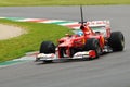 MUGELLO, ITALY 2012: Fernando Alonso of Ferrari F1 team racing at Formula One Teams Test Days at Mugello Circuit in Italy Royalty Free Stock Photo