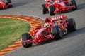 MUGELLO, IT, November, 2007: Official Drivers Felipe Massa, Kimi Raikkonen, Luca Badoer and Marc GenÃÂ¨ run with Modern Ferrari F1 Royalty Free Stock Photo