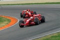 MUGELLO, IT, November, 2007: Official Drivers Felipe Massa, Kimi Raikkonen, Luca Badoer and Marc GenÃÂ¨ run with Modern Ferrari F1 Royalty Free Stock Photo