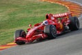 MUGELLO, IT, November, 2007: Official Drivers Felipe Massa, Kimi Raikkonen, Luca Badoer and Marc GenÃÂ¨ run with Modern Ferrari F1 Royalty Free Stock Photo