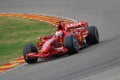 MUGELLO, IT, November, 2007: Official Drivers Felipe Massa, Kimi Raikkonen, Luca Badoer and Marc GenÃÂ¨ run with Modern Ferrari F1 Royalty Free Stock Photo