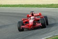 MUGELLO, IT, November, 2007: Official Drivers Felipe Massa, Kimi Raikkonen, Luca Badoer and Marc GenÃÂ¨ run with Modern Ferrari F1 Royalty Free Stock Photo