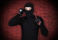 Mugger with flashlight Royalty Free Stock Photo