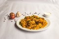 Mughlai Beef Biryani rice pulao with garlic, onion and raita served in plate isolated on background side view of indian and