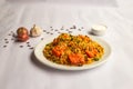 Mughlai Chicken Paneer tikka Biryani rice pulao with garlic, onion and raita served in plate isolated on background side view of