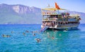 Tourists enjoy daily boat tour