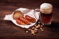 Mugs of beer with snacks Royalty Free Stock Photo