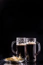 Mugs with beer on table Royalty Free Stock Photo