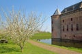 Muiderslot Castle, a medieval castle, with the gardens and spring colors