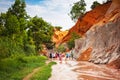 Muine, Vietnam - July 18, 2019 - Fairy Stream. River, red canyon. People walking and taking pictures