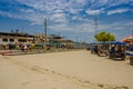 Muisne, Ecuador - March 16, 2016: Buildings in the center of the city, main street, in the coast of Ecuador