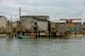 Muisne, Ecuador - March 16, 2016: Muisne waterfront homes as seen from water, modest concrete houses sitting on poles