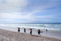 MUIZENBERG BEACH, CAPE TOWN, SOUTH AFRICA - 9 March 2018 : Muizenberg beach is a common morning surf spot for Capetonians. Royalty Free Stock Photo