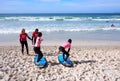 MUIZENBERG BEACH, CAPE TOWN, SOUTH AFRICA - 9 March 2018 : Muizenberg beach is a common morning surf spot for Capetonians. Royalty Free Stock Photo