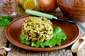 Mujadara - lentils and rice pilaf on wooden background, middle eastern cuisine recipe