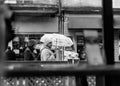 Mukachevo city, Ukraine, 2023. Woman holding an umbrella