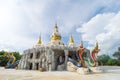 Mukdahan, Thailand - July 31, 2022: Two Nagas at the entrance of the pagoda at Wat Dan Phra In, Nikhom Kham Soi, Mukdahan,