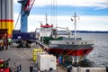 A big ship lies in the port of Mukran near to Sassnitz. Ship discharging and loading at port Royalty Free Stock Photo