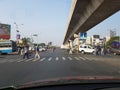 Mukundapur, west bengal, India, 21.3.2018, person crossing the road long zebra crossing under metro railway flyover which is under