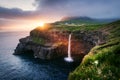 Mulafossur waterfall in Gasadalur, Vagar Island of the Faroe Islands. Royalty Free Stock Photo