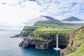 Mulafossur Waterfall with Gasadalur village in the background in