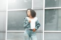 Mulatto black curly girl on street