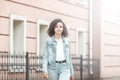 Mulatto black curly girl on street