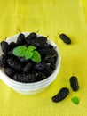 Mulberries on a bright colourful background