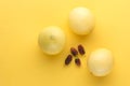 Mulberries with passion fruits, ripe fruits on a yellow background Royalty Free Stock Photo