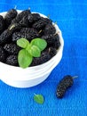 Mulberries in a white bowl