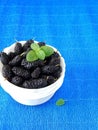 Mulberries in a white bowl