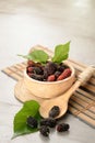 Mulberry fruit leaf food closeup natural wooden vertical view