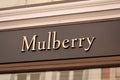 Mulberry logo panel in front of fashion and handbag store. Mulberry is a fashion company known for leather goods. Founded in Engla Royalty Free Stock Photo