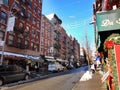 Mulberry Street in New York City during winter daytime against a blue sky