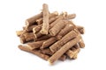 Closeup of Mulethi or Liquorice roots, isolated on white background.