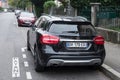 Rear view of black Mercedes SUV parked in the street Royalty Free Stock Photo