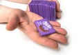 mini chocolate bar by milka compagny in hand on white background
