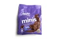 Mini chocolate bar by milka compagny in purple packaging on white background