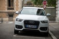 Front view of white Audi Q3 the famous german suv car parked in the street Royalty Free Stock Photo